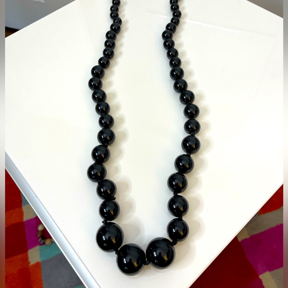 FURLA Italian designer long beaded necklace. Beautiful shiny black beads.